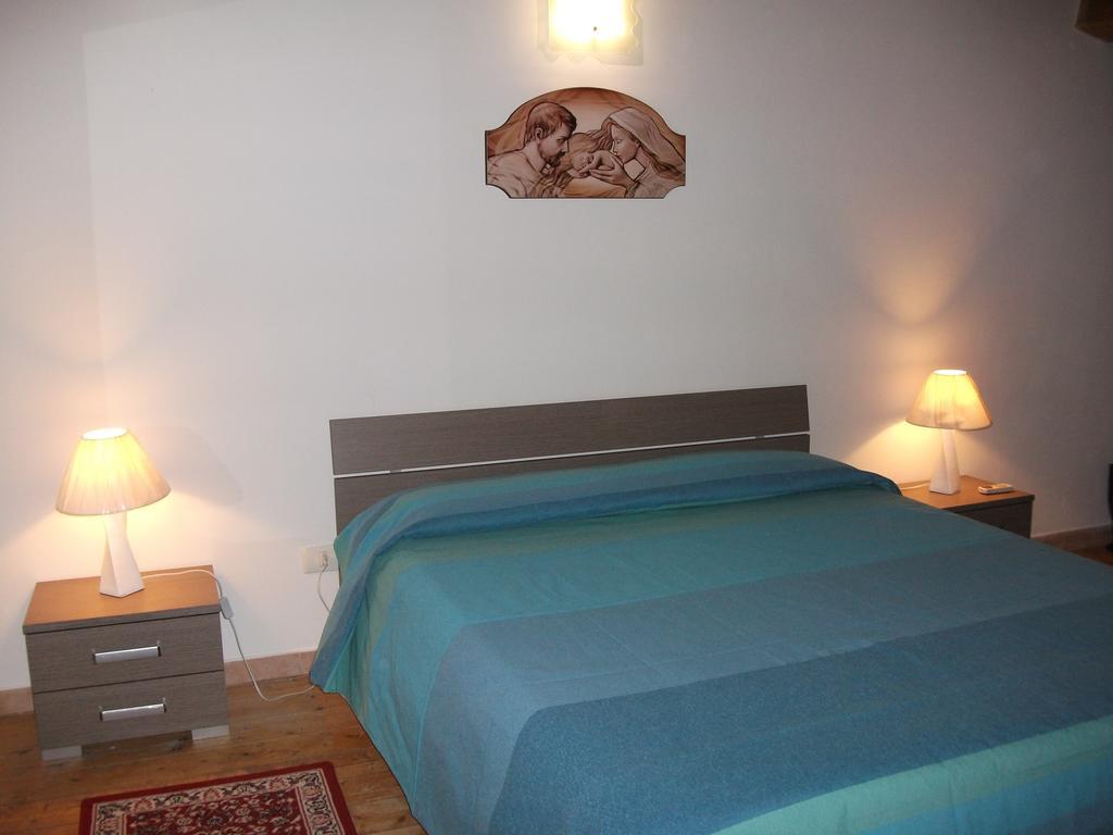 Casa Vacanze Il Quadrifoglio Ното Стая снимка